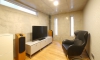 白金のタイル貼りの外断熱住宅の個室